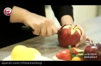 خیلی ساده مهمانی خود را خاص و به یاد ماندنی کنید؛ آموزش حکاکی روی سیب و تزئین آن