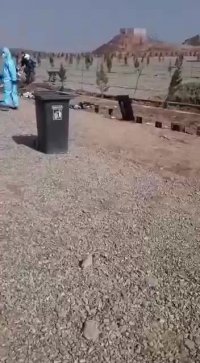 اینجا قم و محل دفن افرادی که در اثر ویروس کرونا فوت شدند