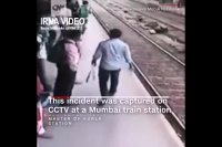 رد شدن قطار از روی یک زن هندی