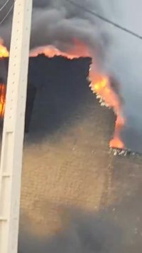 دیوار انبار روغن بر اثر آتش سوزی منهدم شد