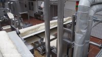 Continuous dough mixing system