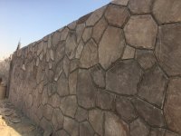 اجرای سنگ مالون اجرای سنگ لاشه در دیوار باغ ویلا باسنگهای مالون لاشه 09124026545