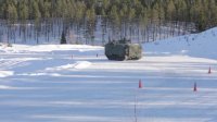 Marines Amphibious Assault Vehicles On Icy Obstacle Course