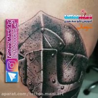 تاتو نقاب گلادیاتور روی بازوی چپ