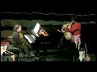 دو نوازی پیانو و نی انبان