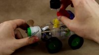 Car made with a bottle - (Rubber Band Powered Car)