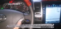 کلید روی فرمان و مانیتور تسلایی تویوتا لندکروز پرادو