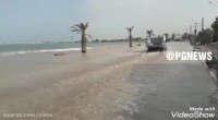 مد دریا در بندر عامری دلوار و زیر آب رفتن راه این روستا